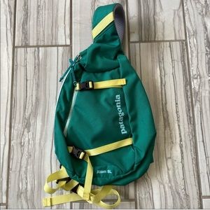 Patagonia Atom 8L sling bag in bright forest green color